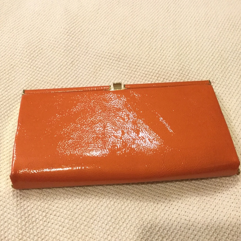 Orange clutch bag from Accessorize